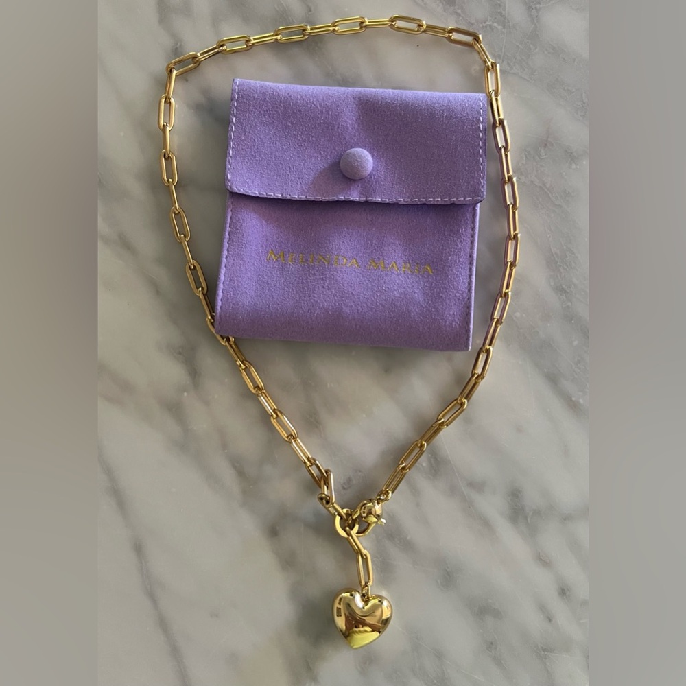 Melinda Maria Gold Paperclip Necklace with Heart Pendant and Purple Pouch